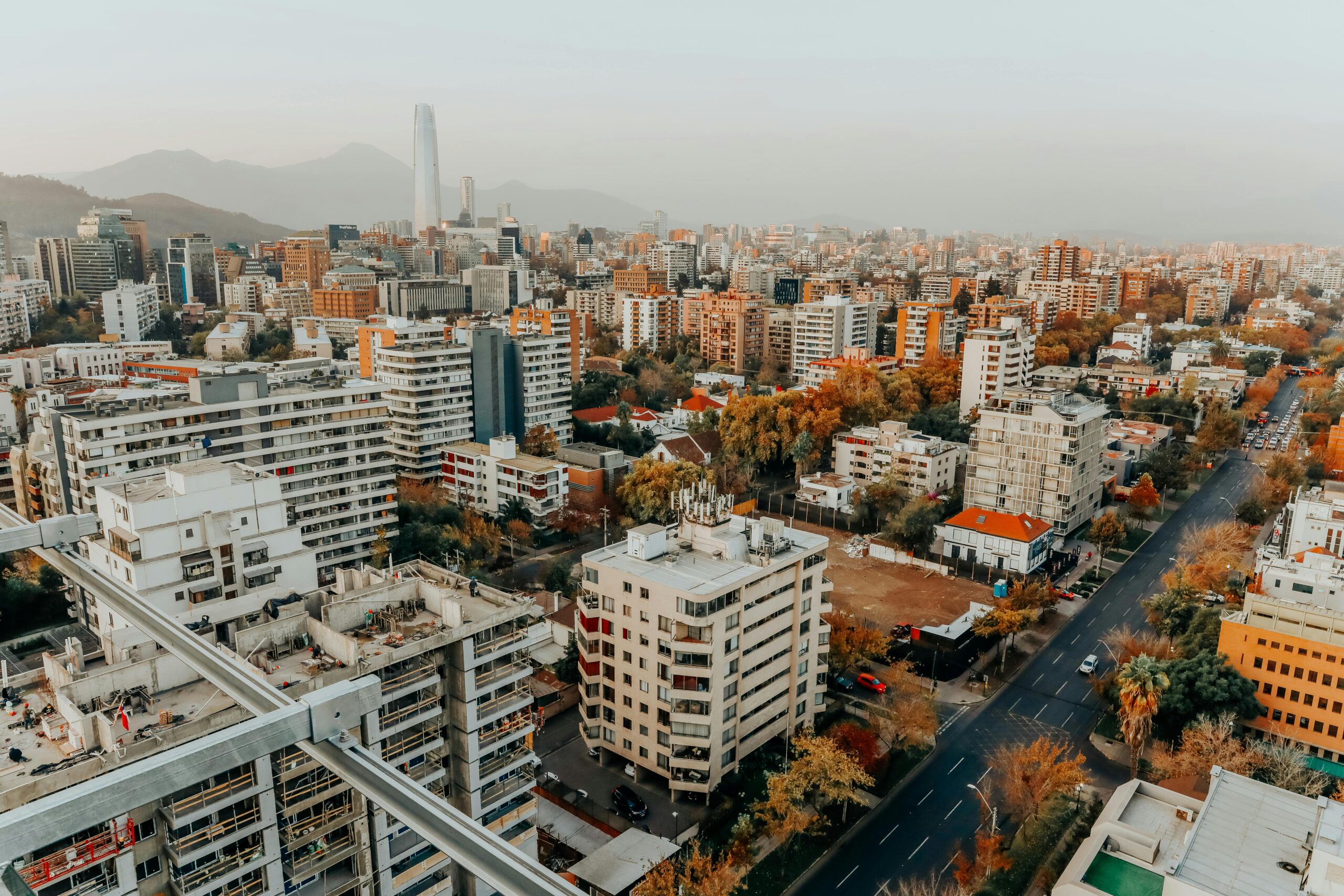 pexels-photo-2305747-2305747 Aerial view of the vibrant Santiago cityscape during the day, showcasing modern architecture.